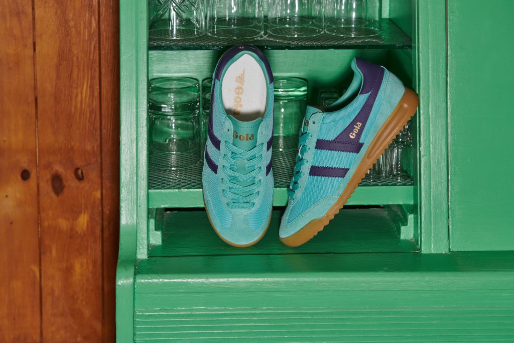 Bright turquoise and navy Tornado trainers